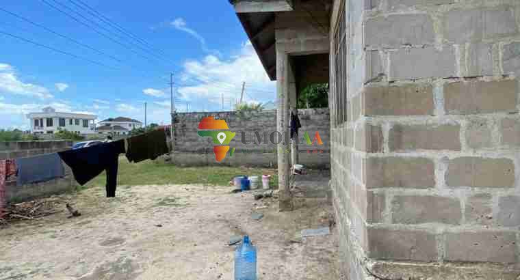 UNFINISHED HOUSE FOR SALE IN MBWENI UBUNGO, DAR ES SALAAM