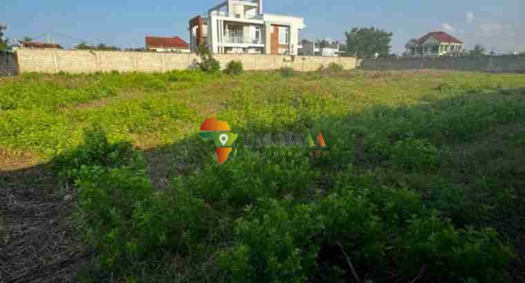 Plot alongside tarmac road for sale in Mbweni JKt