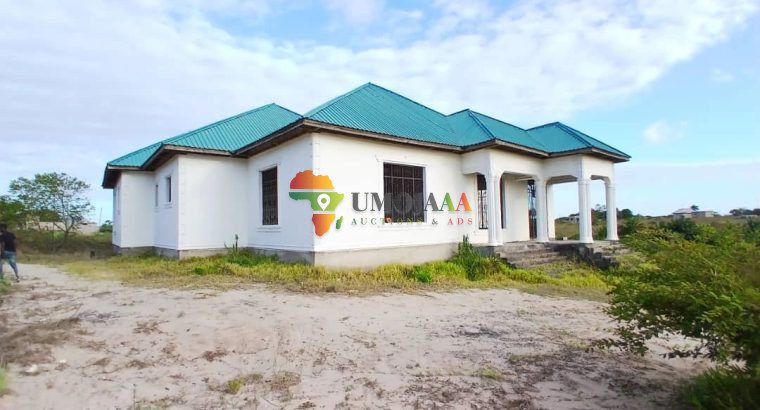 HOUSE WITH ONE ACRE PLOT OF KIGAMBONI CHEKA FOR SALE