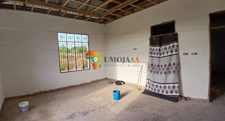 HOUSE WITH ONE ACRE PLOT OF KIGAMBONI CHEKA FOR SALE