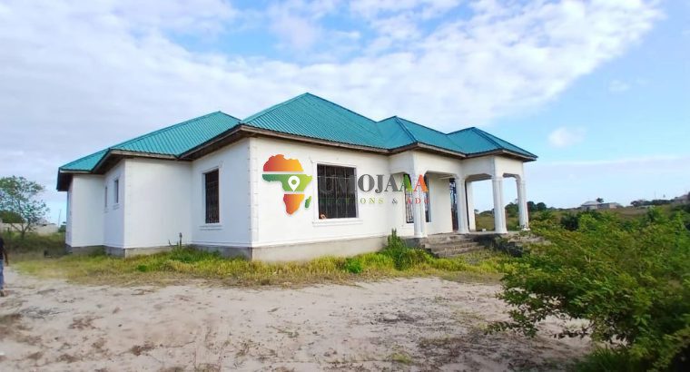 HOUSE WITH ONE ACRE PLOT OF KIGAMBONI CHEKA FOR SALE