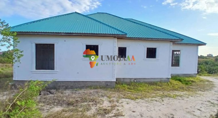 HOUSE WITH ONE ACRE PLOT OF KIGAMBONI CHEKA FOR SALE